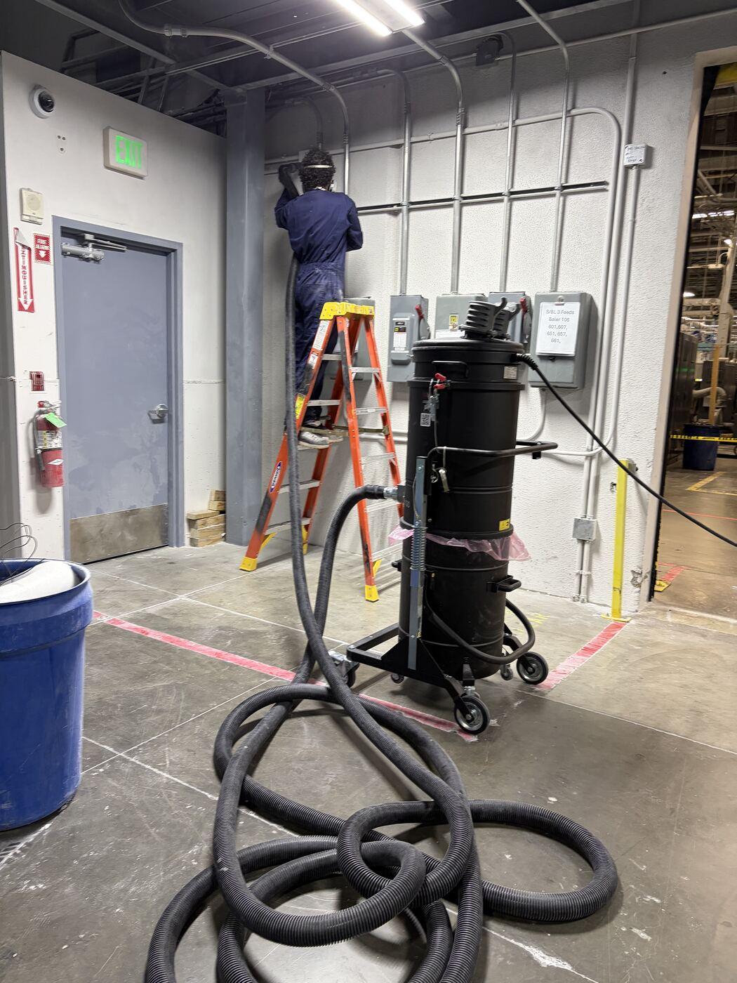 CSA-certified explosion-proof HEPA vacuum unit staged on site